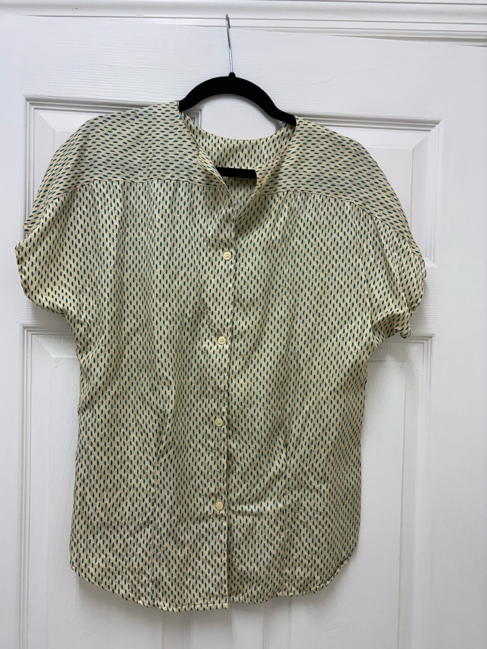 SK & Company silk blouse with small dark green polka dots